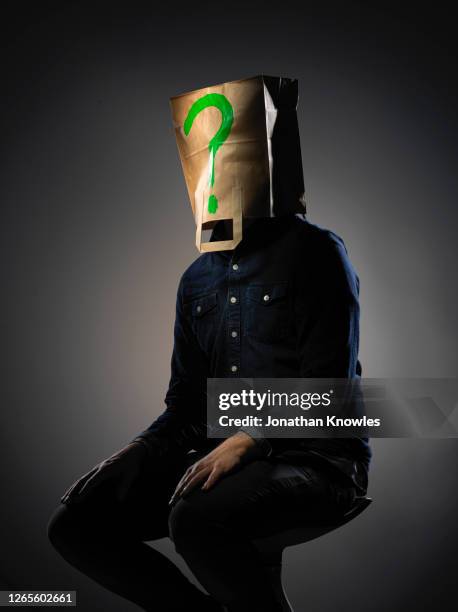 man with bag on head - manquestionmark stock pictures, royalty-free photos & images