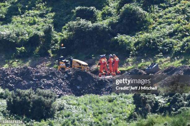 Emergency services attend the scene of a train derailment on August 12, 2020 in Stonehaven, Scotland. Police Scotland said: "A report was received of...