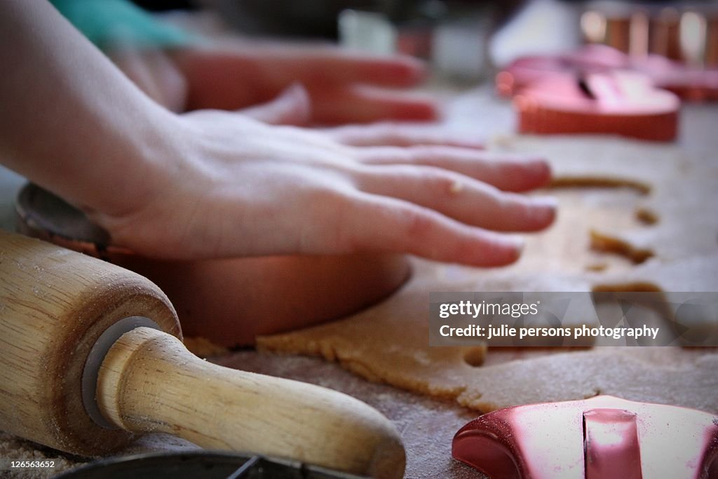 Hand making christmas cookies