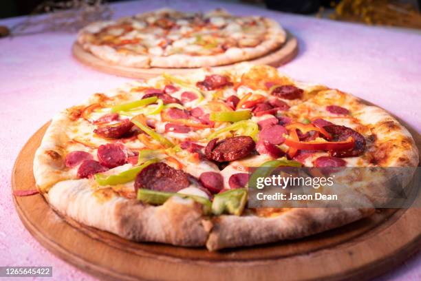 pizza - d20 stock pictures, royalty-free photos & images