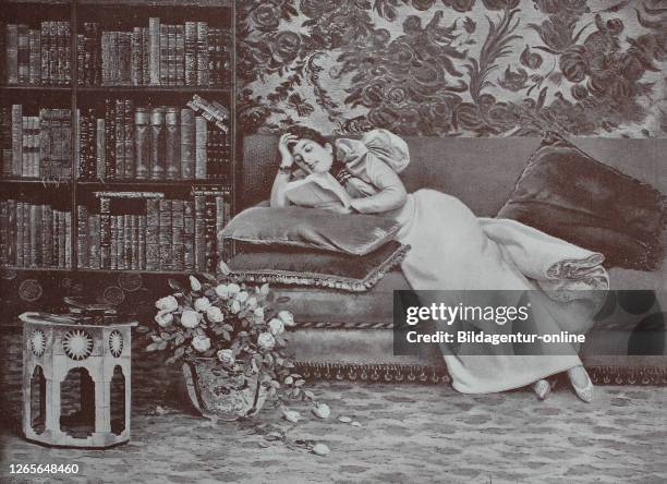 Woman reading in the library, original print from the year 1899, Frau, die in der Bibliothek, liest, Reproduktion einer Originalvorlage aus dem 19....