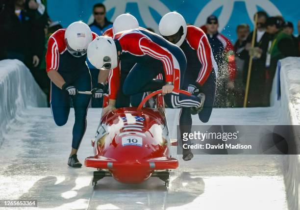 The USA-1 bobsled team of Todd Hays , Randy Jones, Bill Schuffenhauer, and Garrett Hines compete in the 4-Man Bobsleigh event of the 2002 Winter...