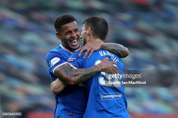 Borna Barisic of Rangers FC celebrates with James Tavernier after scoring his team's first goal during the Ladbrokes Scottish Premiership match...