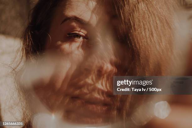 creative portrait of young caucasian woman with red hair - kaléidoscope photos et images de collection