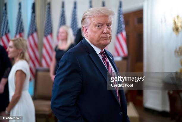 President Donald Trump departs an event titled “Kids First: Getting America’s Children Safely Back to School” August 12, 2020 in the State Dining...