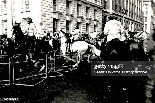 Photographs taken during the Poll Tax riots. The Poll Tax Riots were a series of riots in British towns and cities during protests against the...