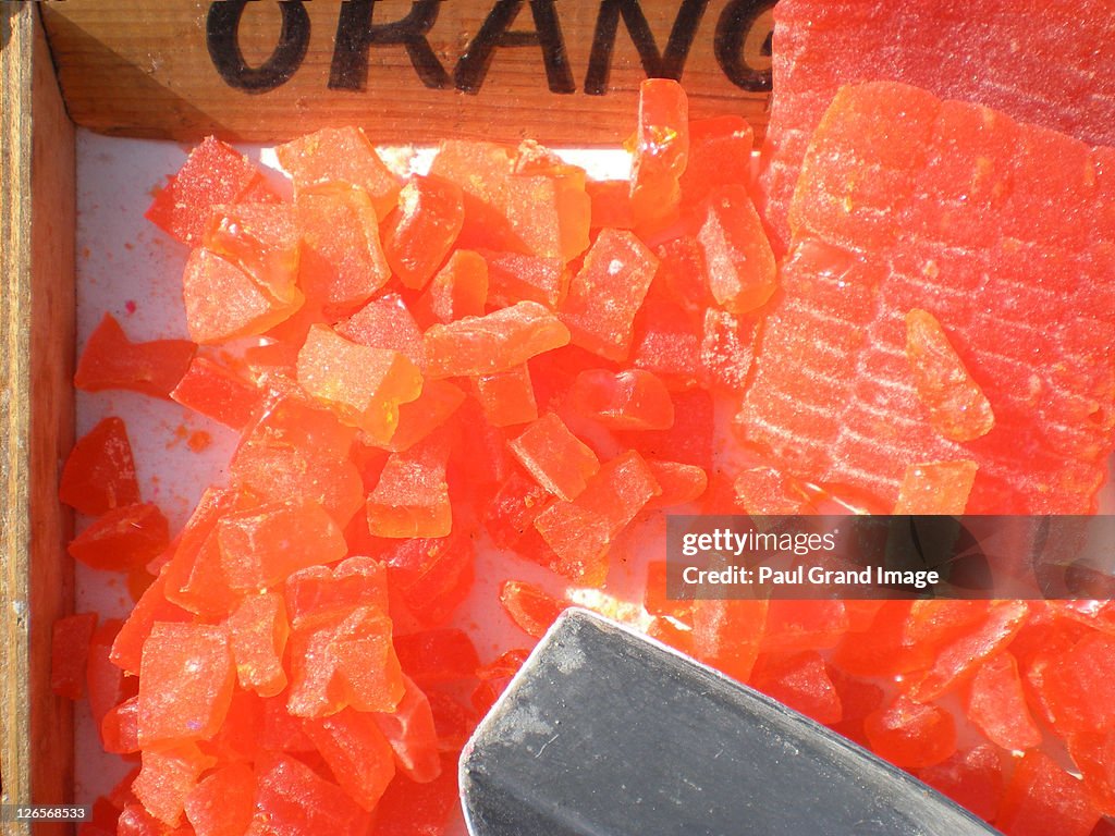 Orange artisan candy in french market