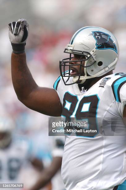 Brentson Buckner of the Carolina Panthers signals a play during an NFL football game against the Atlanta Falcons on October 2, 2004 at Ericsson...