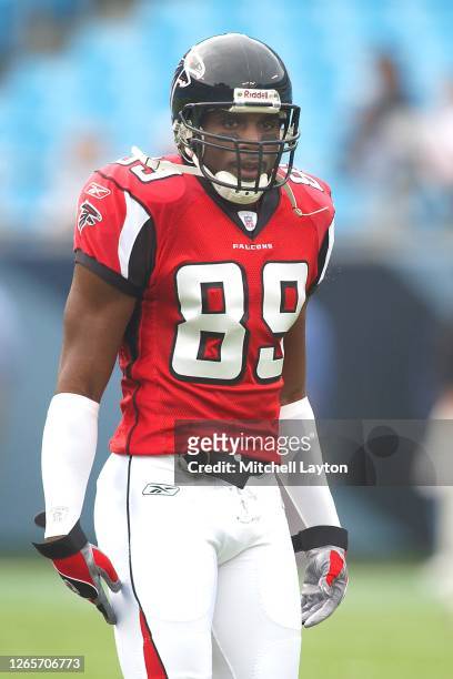 Dez White of the Atlanta Falcons looks on before a NFL football game against the Carolina Panthers on October 2, 2004 at Ericsson Stadium in...