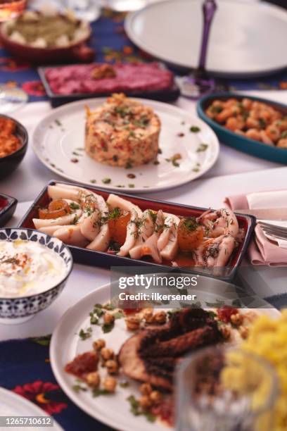 turkish and greek traditional dinning table with special alcohol drink raki - ouzo stock pictures, royalty-free photos & images