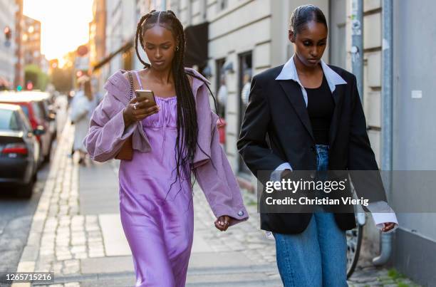 Guests seen outside Saks Potts during Copenhagen Fashion Week Spring/Summer 2021 on August 12, 2020 in Copenhagen, Denmark.