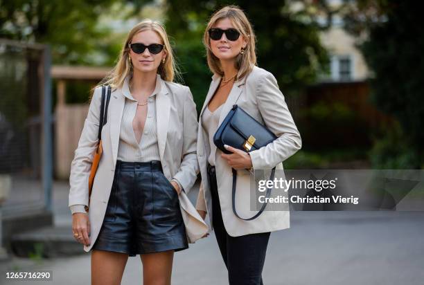 Tine Andrea and Darja Barannik seen wearing light white blazer, old Celine bag, shorts outside By Malene Birger during Copenhagen Fashion Week...