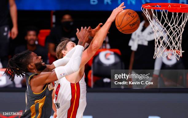 Nerlens Noel of the Oklahoma City Thunder and Kelly Olynyk of the Miami Heat go after a rebound during the first quarter at Visa Athletic Center at...