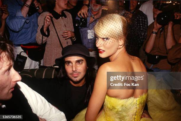 Steven Meisel and Linda Evangelista attend a Fashion Party during Paris Fashion Week in the 1990s in Paris, France.