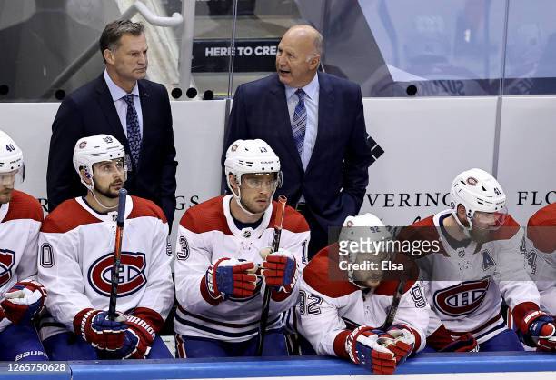 Head coach Claude Julien of the Montreal Canadiens looks on from the bench in the second period against the Philadelphia Flyers in Game One of the...
