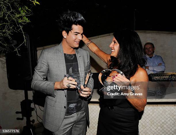 Adam Lambert and Leila Lambert pose for a photo with their awards at the the 2011 PFLAG National LA Event on September 25, 2011 in Beverly Hills,...