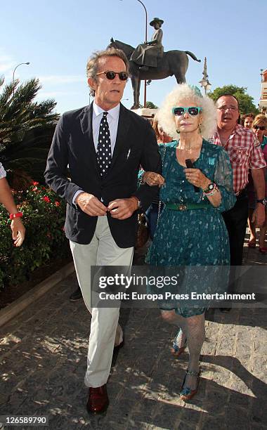 Duchess of Alba, Cayetana Fitz-James Stuart, and Alfonso Diez attend bullfighs at La Maestranza Bullring on September 25, 2011 in Seville, Spain.