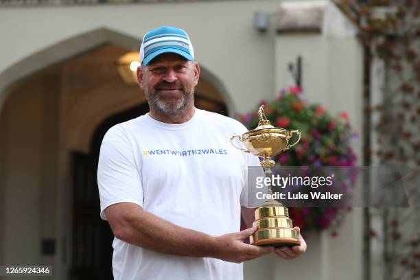 Thomas Bjorn poses with the Ryder Cup Trophy before starting the Walk From #Wentworth2Wales in aid of UNICEF & The Golf Foundation at Wentworth Golf...