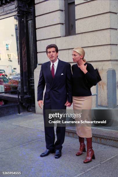 John Kennedy Junior and new wife, Carolyn Bessette Kennedy pose after leaving their Tribeca loft after John introduced Carolyn to the waiting press...