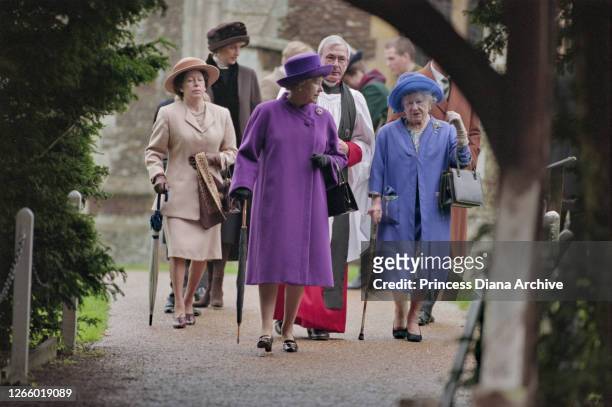 British Royals Diana, Princess of Wales , wearing a brown coat with black trim and a matching winter hat, Princess Margaret , Queen Elizabeth II and...
