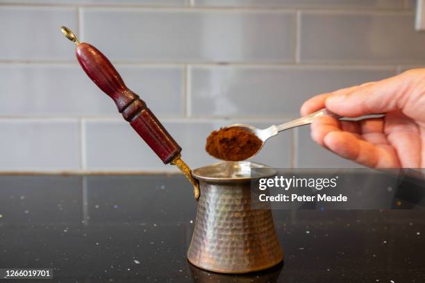 making turkish coffee - cezve stockfoto's en -beelden