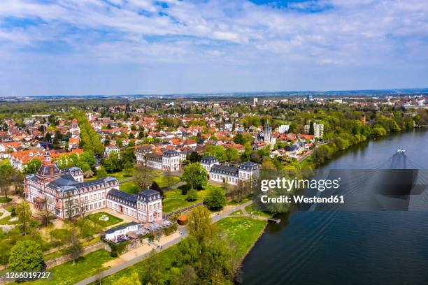 germany, hesse, hanau, helicopter view of town on bank of river main in summer - hanau stock-fotos und bilder