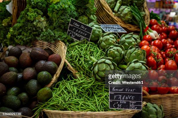 fresh vegetables sold at market - market stall stock pictures, royalty-free photos & images