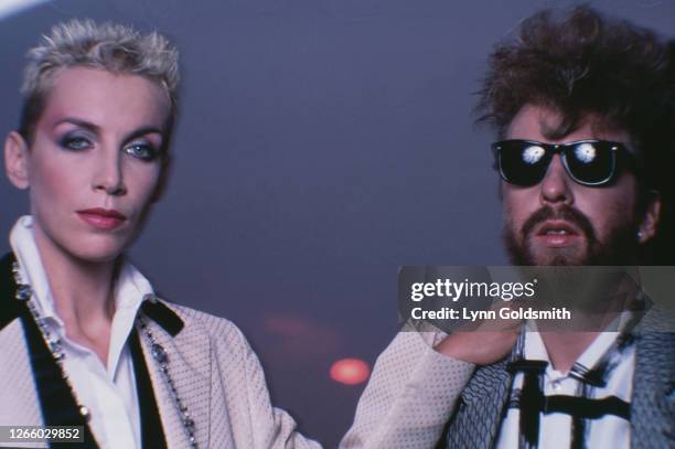 Studio portrait of British pop duo The Eurythmics , against a grey background, 1984.