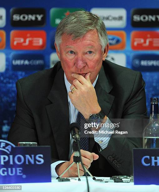 Manager Sir Alex Ferguson of Manchester United attends a press conference ahead of their UEFA Champions League Group C match against Basel at Old...