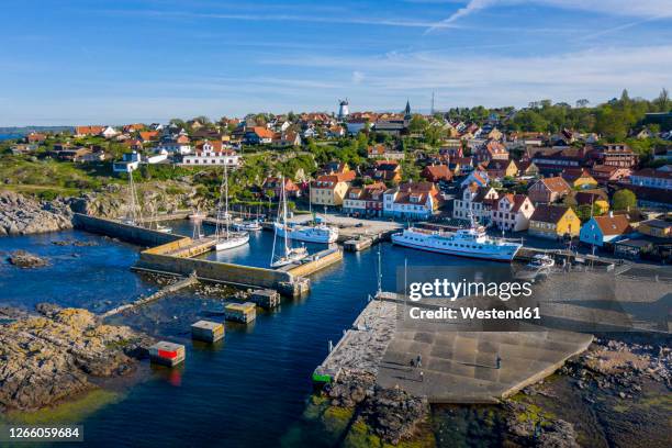 denmark, bornholm, gudhjem municipality (gotterheim), town and harbor - bornholm island stock pictures, royalty-free photos & images