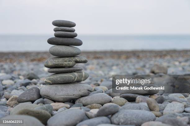 pebbles stack, zen art, rocks tower - balance stones stock pictures, royalty-free photos & images
