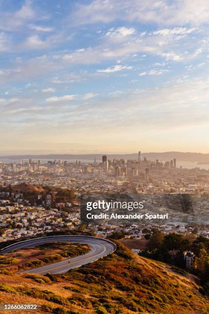san francisco skyline at sunrise seen from twin peaks mountains, california, usa - twin peaks stock pictures, royalty-free photos & images