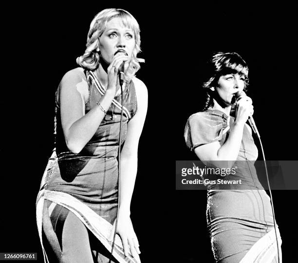 Agnetha Faltskog and Anni-Frid Lyngstad of ABBA perform on stage at the Wembley Arena, London, England, on November 5th, 1979.