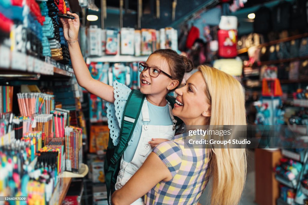 Mother and daughter in a bookstore