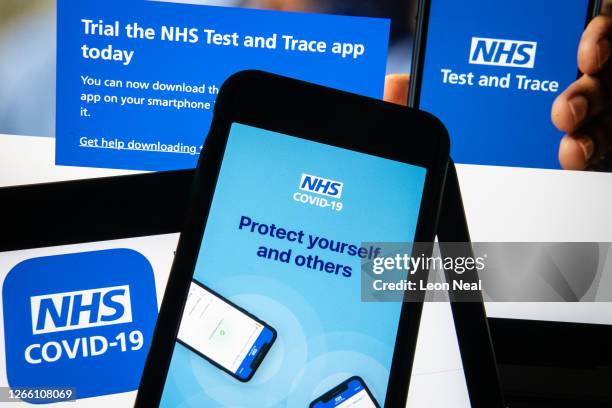 In this photo illustration the official NHS Covid-19 "Test and Trace" contact tracing app is seen on a screen on August 13, 2020 in London, England....