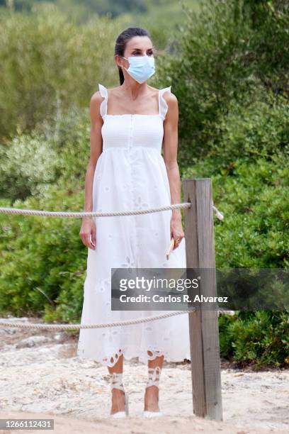 Queen Letizia of Spain is seen arrive at the Naveta des Tudons, oldest building in Europe, asset of cultural interest and an example of the Talayotic...