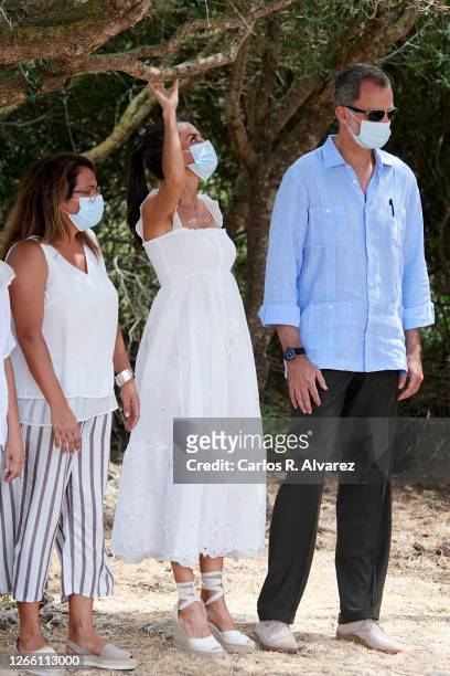 King Felipe VI of Spain and Queen Letizia of Spain are seen arrive at the Naveta des Tudons, oldest building in Europe, asset of cultural interest...