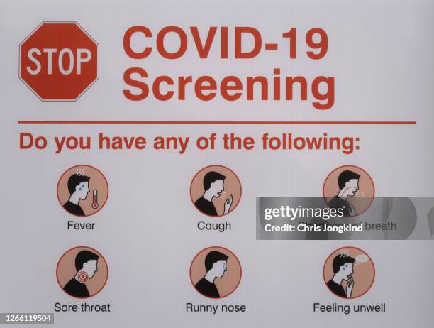 covid-19 screening poster - covid 19 symptoms stock pictures, royalty-free photos & images