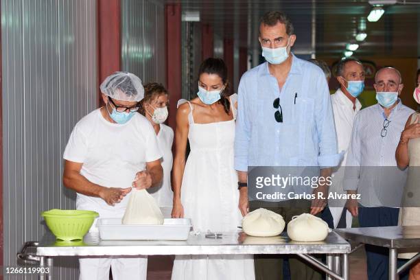 King Felipe VI of Spain and Queen Letizia of Spain visit the Insular Livestock Cooperative , in Alaior. The largest producer of emblematic cheese on...