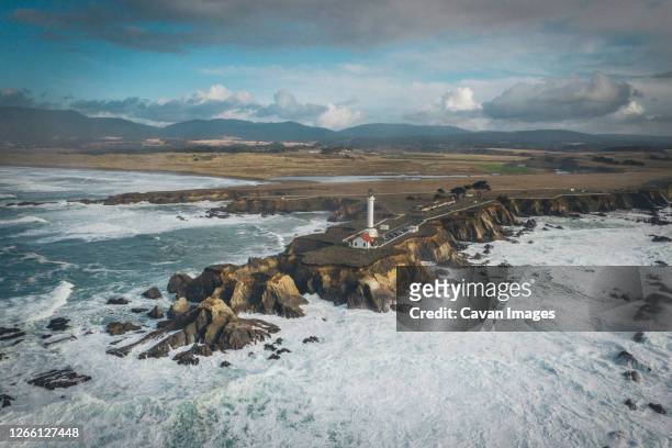 lighthouse on the pacific coast from above, point arena, california - mendocino stock-fotos und bilder