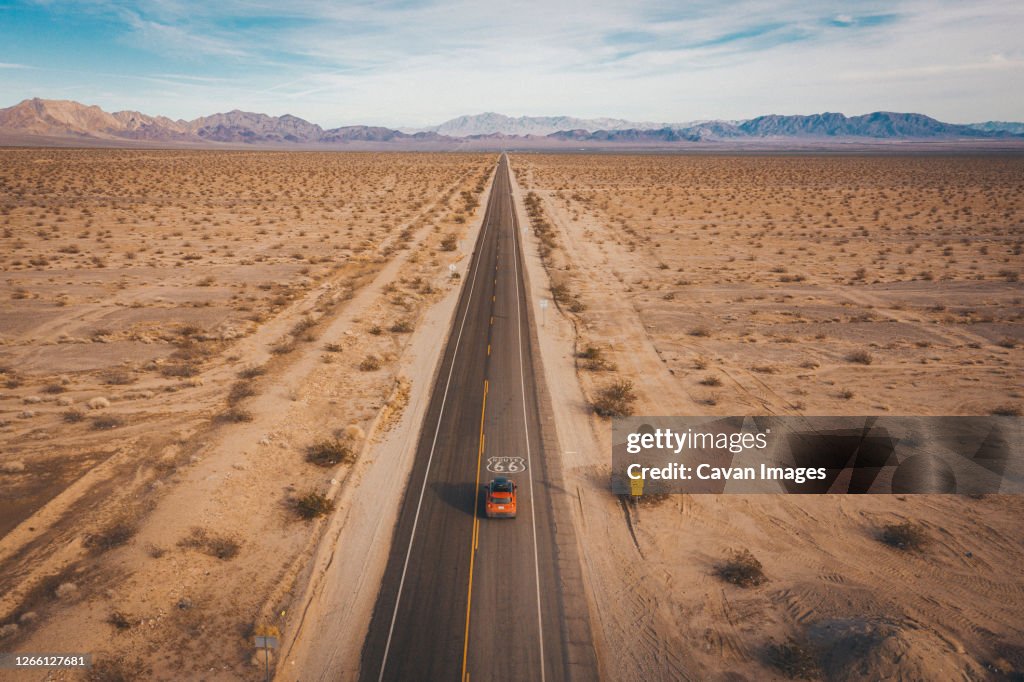 A car on Highway 66 from above, California