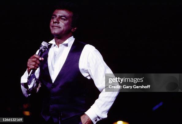 Tony Mathis Singer American Pop and Jazz singer Johnny Mathis performs onstage at Radio ...