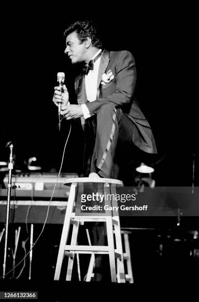 American Pop and Jazz singer Johnny Mathis performs onstage at Radio City Music Hall, New York, New York, September 9, 1982.
