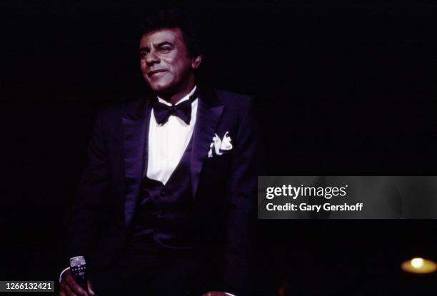 American Pop and Jazz singer Johnny Mathis performs onstage at Radio City Music Hall, New York, New York, September 9, 1982.