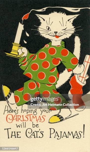 An illustrated Christmas card features a cat in polka dot pajamas carrying a present-filled stocking and wax candle, circa 1932.
