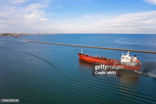 aerial view of tanker ship carrying oil or gas at sea. - tanker ship stock pictures, royalty-free photos & images