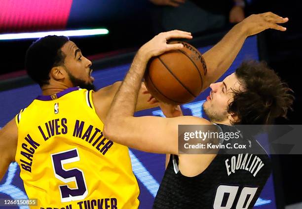 Talen Horton-Tucker of the Los Angeles Lakers knocks the ball from Nemanja Bjelica of the Sacramento Kings during the third quarter at The Field...