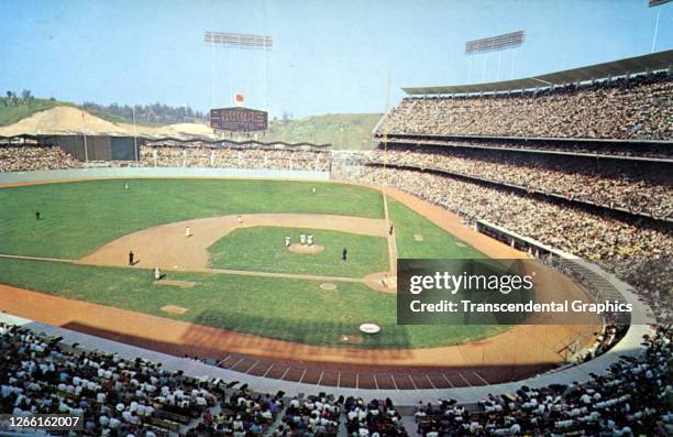 Postcard of a baseball game in progress at Dodger Stadium, Los Angeles, California, mid 1960s.