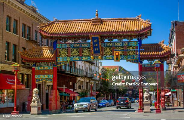 chinatown gate, victoria, british columbia, canada - chinatown stock pictures, royalty-free photos & images