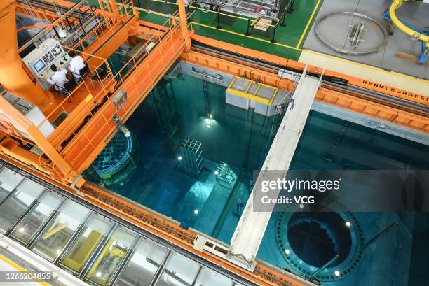 Operators have a training session on a simulated refueling water storage tank at the Daya Bay Nuclear Power Base on August 13, 2020 in Shenzhen,...